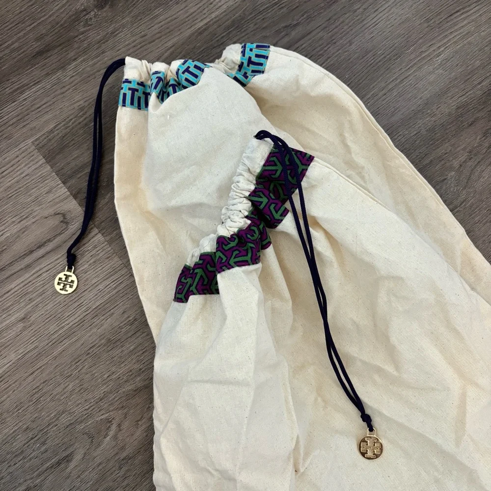 Set of 2 Tory Burch drawstring dust bags, canvas with gold charm